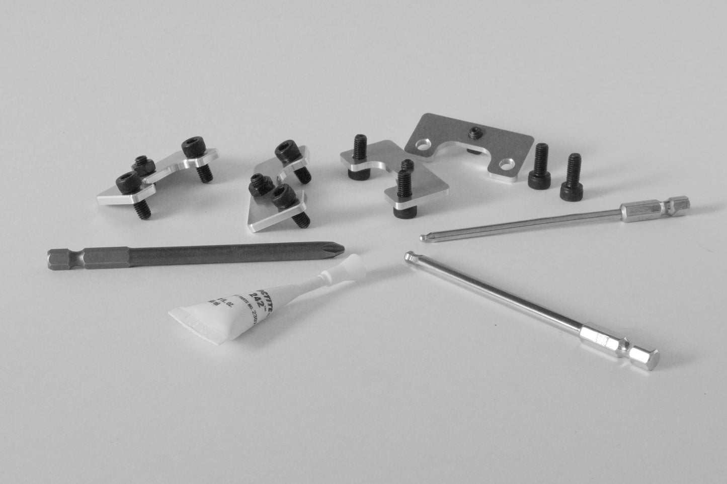 precision roller pressure adjuster to eliminate snipe along Loctite, Philips bit, 4mm hex, 2.5mm hex to install and make adjustments.