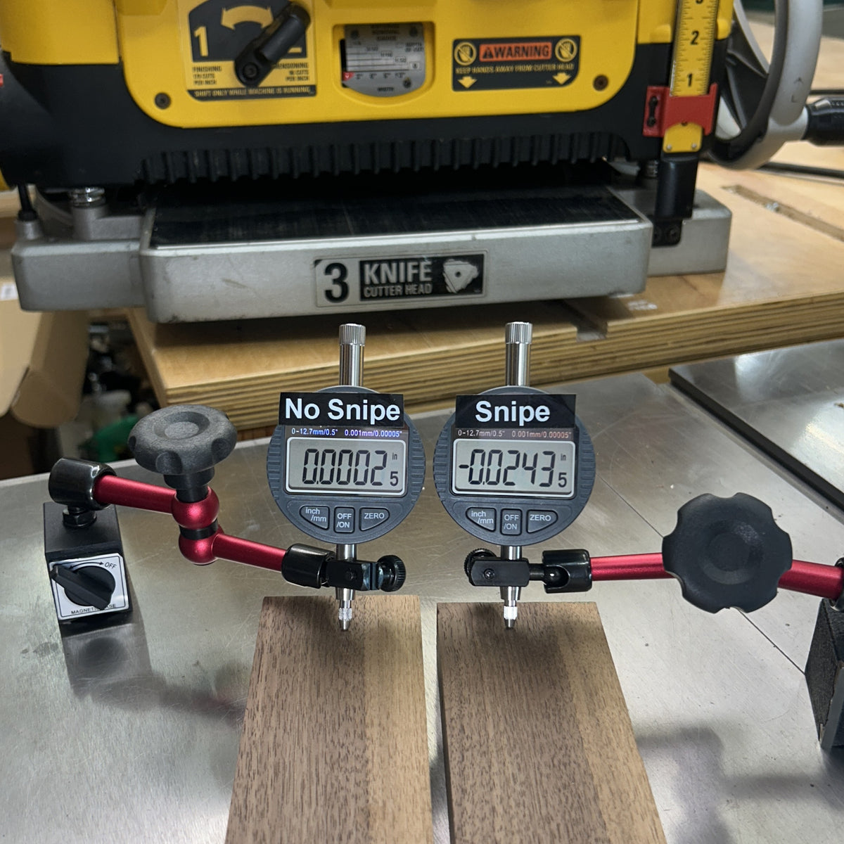 Dial indicators on two boards from a DeWalt DW735: 0.024 in snipe without the kit, 0.0003 in with the Planer Snipe Fix Kit